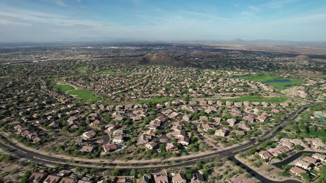Beautiful Neighborhood Golf Course in Arizona Shot from Above by Drone