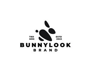 abstract jumping bunny rabbit logo concept vector illustration