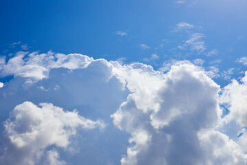 blue sky with fluffy clouds