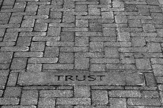 A Brick Walkway With The Word 