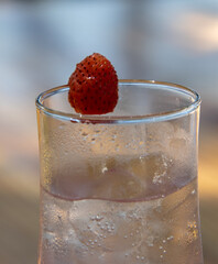 A refreshing cocktail isolated on a wooden table
