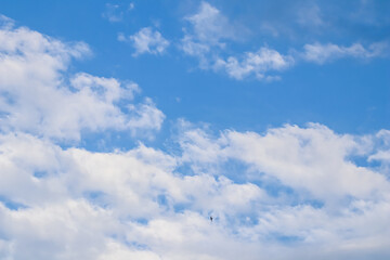 Background of blue sky with white clouds