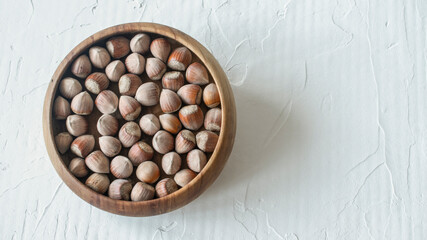 hazelnut in a wooden plate