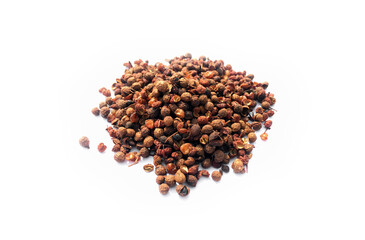Sichuan pepper on white background, chinese food ingredients concept. Soft and selective focus on Sichuan pepper.