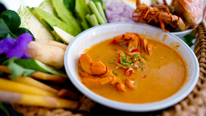 Rice noodles in crab curry sauce with vegetables
