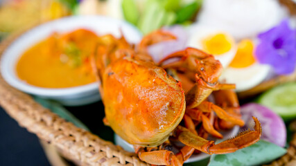 Rice noodles in crab curry sauce with vegetables