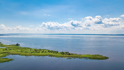 Dnipro river and green meadows aerial view from above, Dnieper river spring landscape, Ukraine
