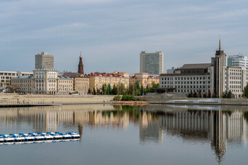 View of the embankment of Kaban Lake in Tatarskaya Sloboda and Tatarstan Street on a sunny spring day, Kazan, Republic of Tatarstan, Russia