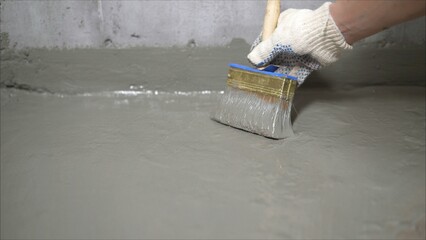 The process of applying mortar - waterproofing to a concrete floor. The concept of waterproofing...