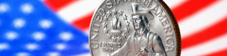 US quarter dollar coin with drummer closeup and USA flag. Stars and stripes in the blur. Beautiful...