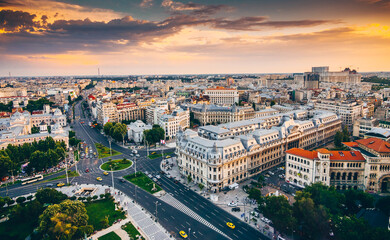 Bucharest view from above during summer sunrise. Landmarks of the capital city of Romania.