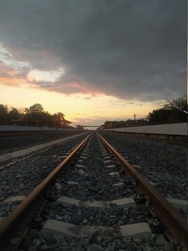 railway train at sunset time.