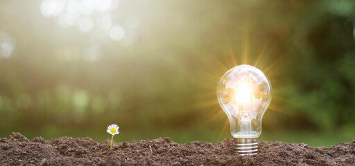 Green energy innovation light bulb with future industry of power generation icon graphic interface....