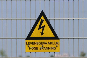 Sign with electricity warning life-threatening at Bleiswijk high voltage station of Tennet