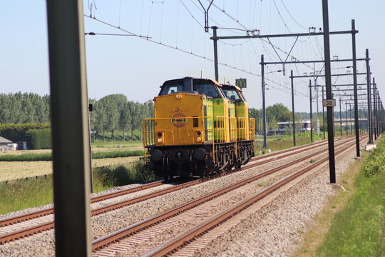 V100 diesel locomotive of Railroad feeders on track at Moordrecht