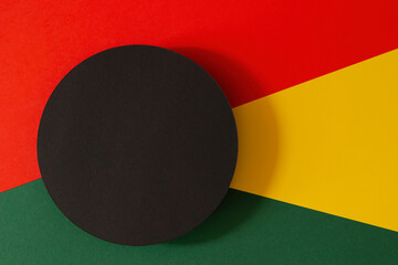 Abstract geometric black, red, yellow, green color background. Black History Month background with...