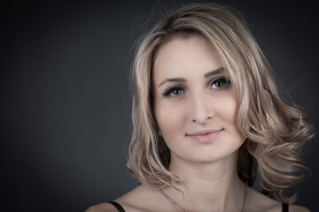 Fototapeta premium portrait of a young woman in a photo studio