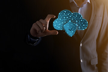 Cloud technology. Polygonal wireframe cloud storage sign with shield with a tick on dark blue....