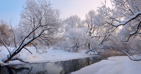 Winter frosty landscape with snow covered trees 