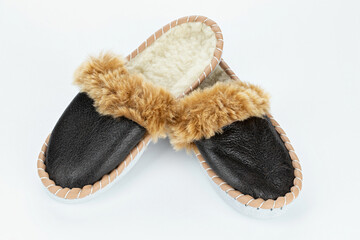 Warm slippers on a white background.