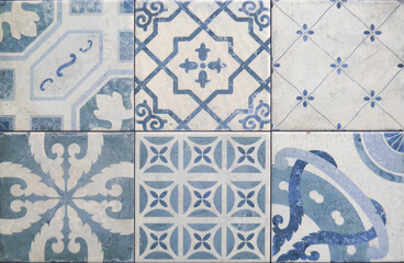 Tile texture on the wall. Decorative insert. Mosaic art. Roman style. Architectural tile insert