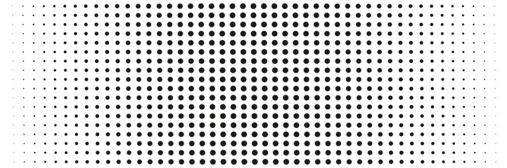 Pattern of black dots of different sizes on a white background