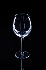 glass goblet on a black background