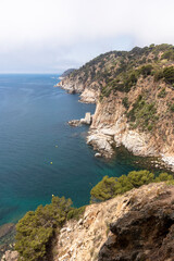 Fototapeta na wymiar cliffs in tossa de mar a sunny summer day