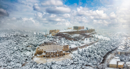 The Parthenon Temple and the Herodion Theater at the Acropolis of Athens, Greece, during a winter...