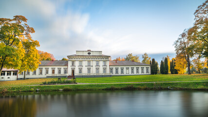 Taujėnai, Lithuania 10-02-2021..Taujėnai manor amazing autumn nature. Classicist palace with a...