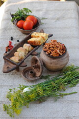 still life in clay pots on burlap
