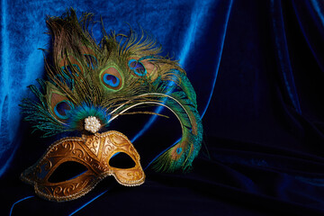 Luxury venetian mask on dark blue background. Carnival masquerade fantasy mask - obrazy, fototapety, plakaty