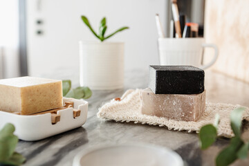 Vegan cosmetics and cruelty free. Zero waste. Organic cotton sponge. Plant in the background