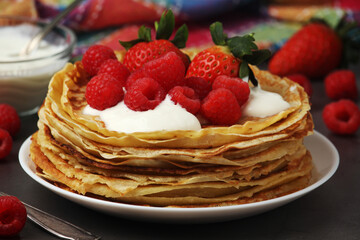 Russian cuisine national dish bliny with fresh berries