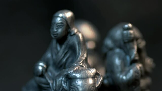 Metal figurines of monks
