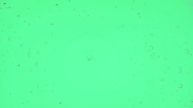 Oil bubbles in slow motion, gradient lighting, macro, template, background for perfume advertising
