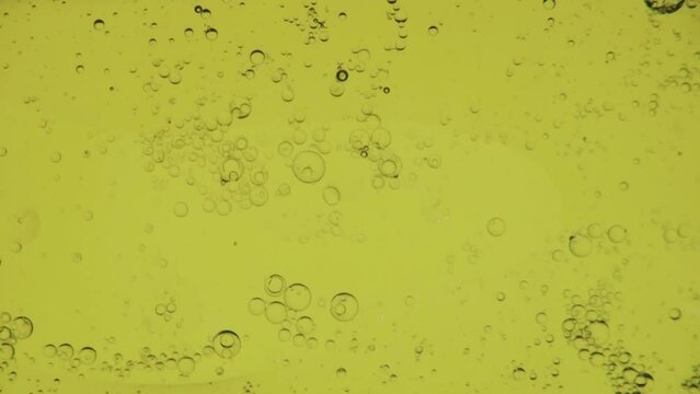 Oil bubbles in slow motion, gradient lighting, macro, texture for background