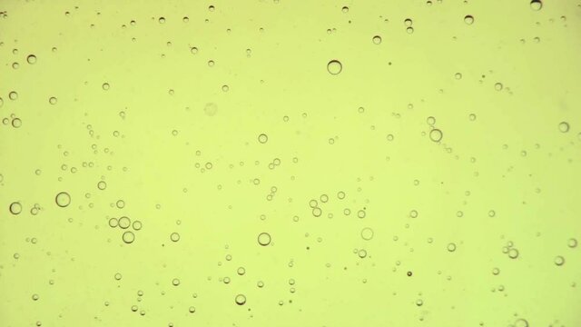 Oil bubbles in slow motion, gradient lighting, macro, texture for background
