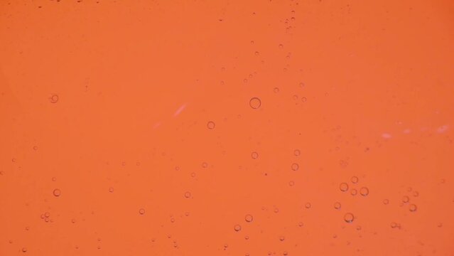 Oil bubbles in slow motion, gradient lighting, macro, template, background for perfume advertising