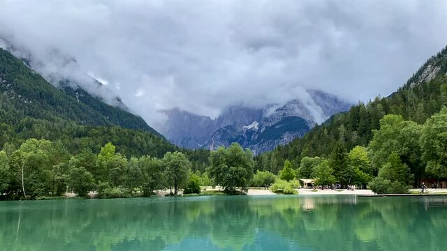 Timelapse of weather above a slovenian mountain lake