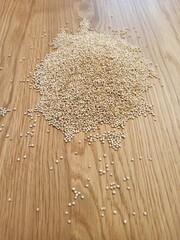 Quinoa on wooden table