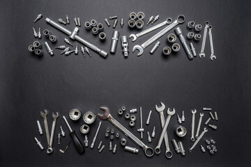 Tool set on black background. Mechanic tools, wrenches or spanners. Technique repair, equipment for...