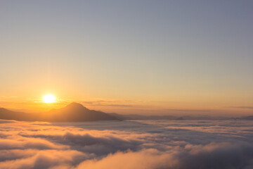 Fototapeta na wymiar Beautiful sunlight and fog at Phu Thok Mountain at Chiang Khan ,Loei Province in Thailand
