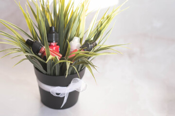 tubes with pigments for permanent lip makeup on a light background