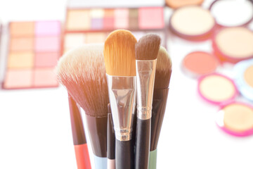 Blurred, Professional makeup brushes and tools, make up products professional decorative cosmetics makeup tools and accessory on white background, beauty, fashion, party and shopping concept, top view