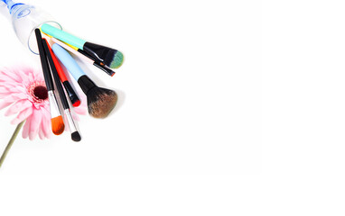 Professional makeup brushes and makeup tools, accessory on white background with copy space for text. beauty, fashion, party and shopping concept, top view