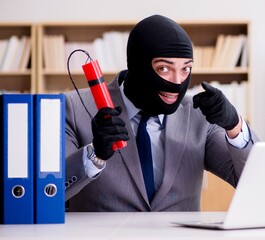 Criminal businessman with balaclava with dynamite