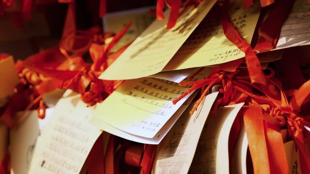 Paper prayers in the Xu Yuan Qiang temple - Shanghai China