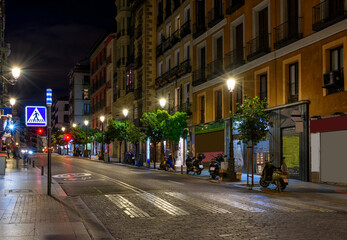 Calle Mayor is old street in Madrid, Spain. Architecture and landmark of Madrid. Night cityscape of Madrid.