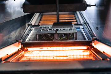 soldering iron on a platin microchip smd industry
